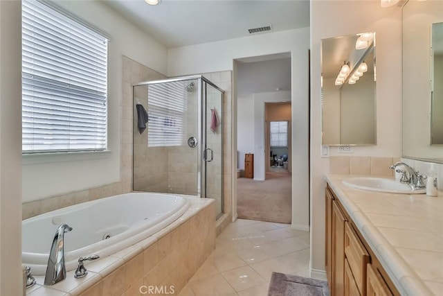 3607 Cascara Ct, Simi Valley, CA 93065 - bathroom with a stall shower, a whirlpool tub, tile patterned flooring, vanity, and plenty of natural light