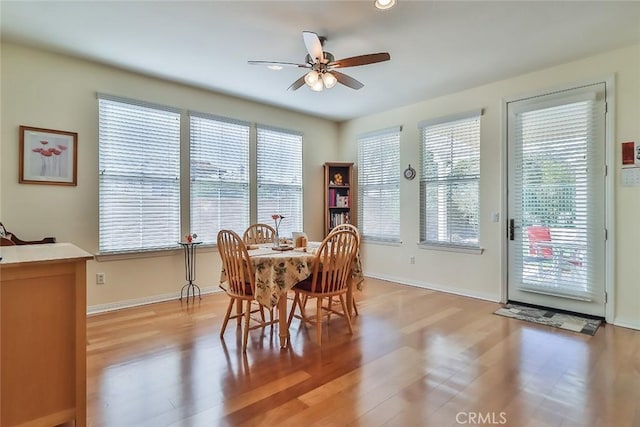 3607 Cascara Ct, Simi Valley, CA 93065 - dining area with light wood-style flooring, plenty of natural light, ceiling fan, and baseboards