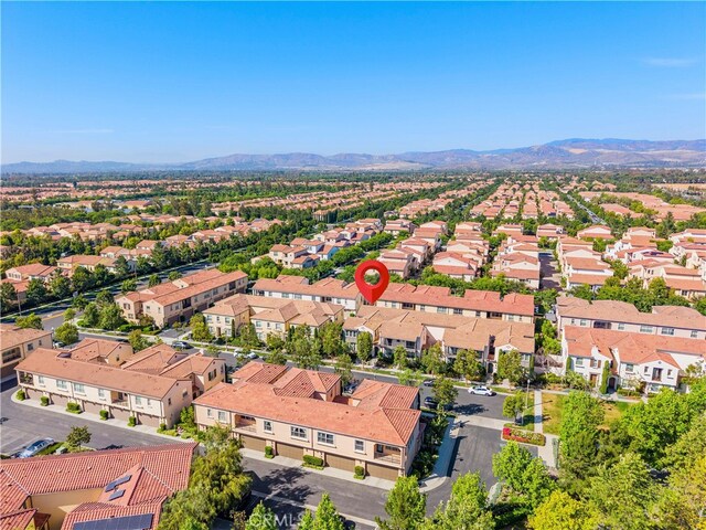61 Jade Flower, Irvine, CA 92620 - aerial perspective of suburban area with mountains