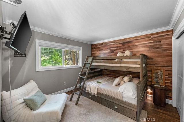 635 Grass Valley Rd, Lake Arrowhead, CA 92352 - bedroom featuring crown molding, baseboards, and wooden walls