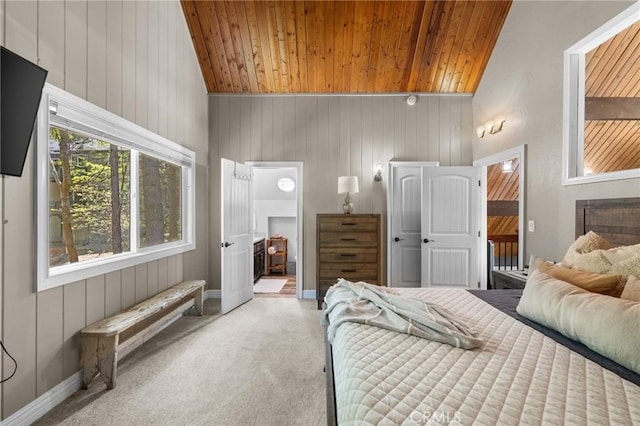 635 Grass Valley Rd, Lake Arrowhead, CA 92352 - bedroom featuring wood ceiling, carpet flooring, wood walls, baseboards, and high vaulted ceiling