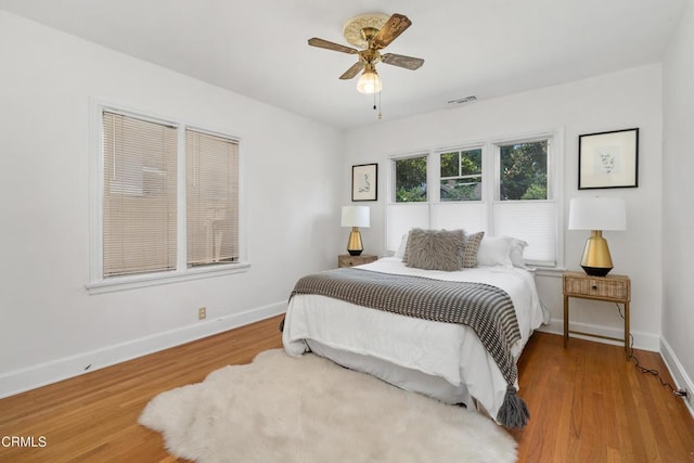1675 N El Molino Ave, Pasadena, CA 91104 - bedroom with baseboards, wood finished floors, and ceiling fan
