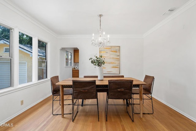 1675 N El Molino Ave, Pasadena, CA 91104 - dining area featuring a chandelier, light wood-style flooring, baseboards, and ornamental molding