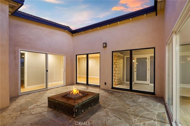 33292 Bremerton St, Dana Point, CA 92629 - patio terrace at dusk featuring a fire pit and a patio area