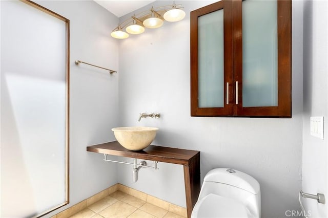33292 Bremerton St, Dana Point, CA 92629 - bathroom with a sink, toilet, tile patterned floors, and baseboards