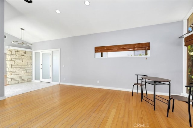 33292 Bremerton St, Dana Point, CA 92629 - unfurnished living room with wood finished floors, baseboards, plenty of natural light, recessed lighting, and vaulted ceiling