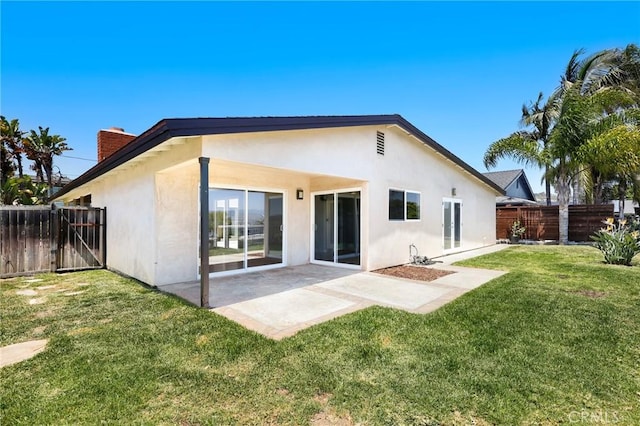 33292 Bremerton St, Dana Point, CA 92629 - back of house featuring stucco siding, a chimney, and a patio area