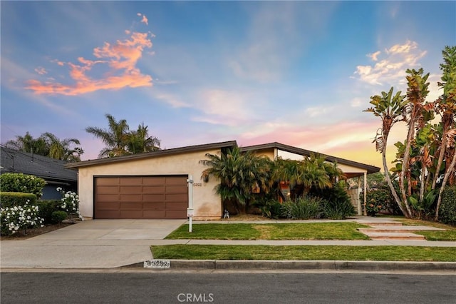 33292 Bremerton St, Dana Point, CA 92629 - view of front of property with driveway, a garage, and stucco siding