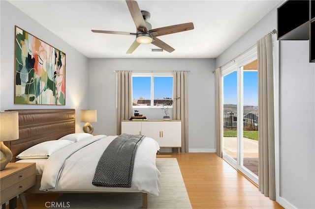 33292 Bremerton St, Dana Point, CA 92629 - bedroom with access to outside, light wood finished floors, a ceiling fan, and baseboards