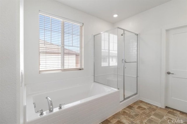 4852 S Jordan Ave, Ontario, CA 91762 - full bathroom featuring a garden tub and a stall shower