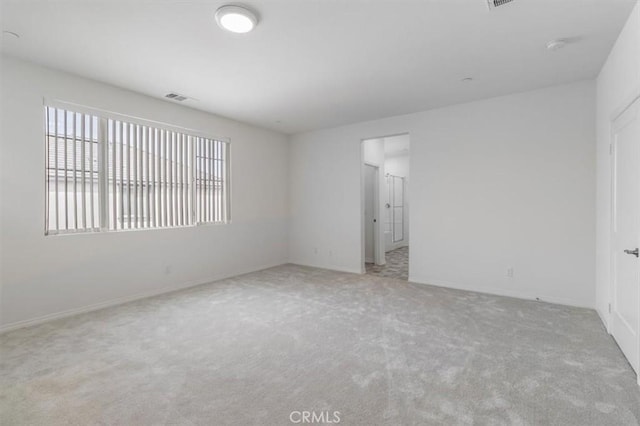 4852 S Jordan Ave, Ontario, CA 91762 - carpeted spare room featuring baseboards