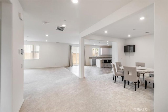 4852 S Jordan Ave, Ontario, CA 91762 - dining area featuring plenty of natural light, recessed lighting, and light colored carpet