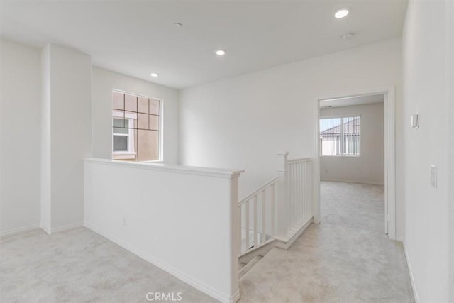 4852 S Jordan Ave, Ontario, CA 91762 - hallway with an upstairs landing, carpet floors, recessed lighting, and baseboards