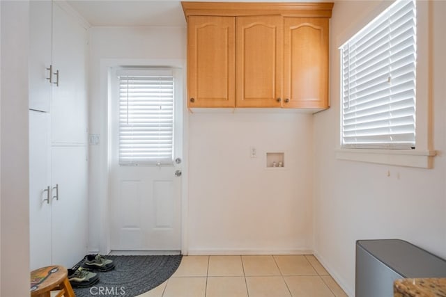 10404 Jardine Ave, Sunland, CA 91040 - laundry area featuring light tile patterned floors, baseboards, and hookup for a washing machine