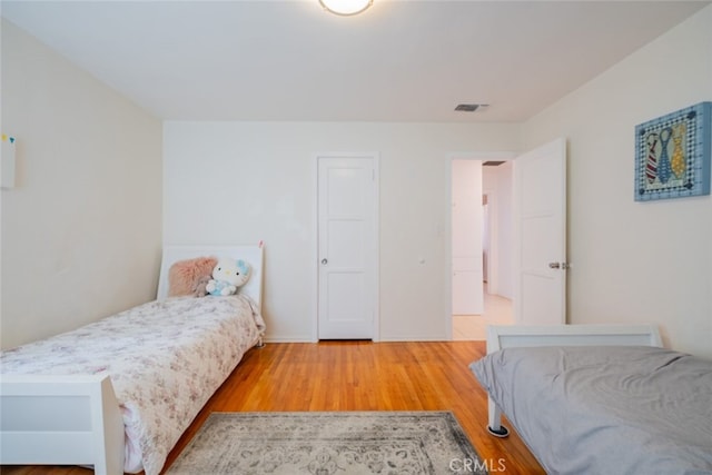 10404 Jardine Ave, Sunland, CA 91040 - bedroom with wood finished floors and baseboards