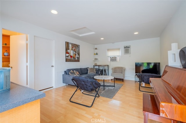 10404 Jardine Ave, Sunland, CA 91040 - living room with attic access, light wood-style floors, recessed lighting, and baseboards