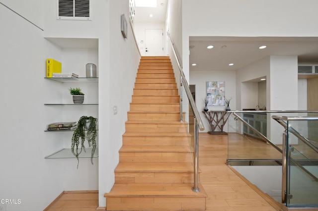 1196 Montecito Dr, Los Angeles, CA 90031 - stairs featuring wood finished floors and recessed lighting