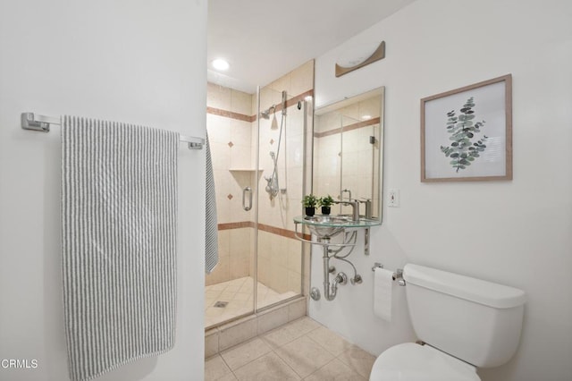 1196 Montecito Dr, Los Angeles, CA 90031 - full bathroom with toilet, tile patterned flooring, and a shower stall