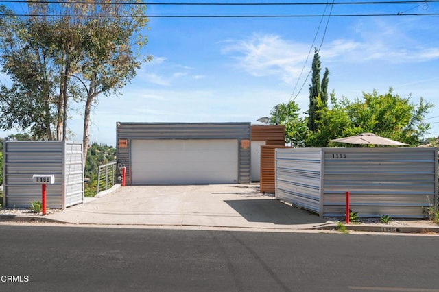 1196 Montecito Dr, Los Angeles, CA 90031 - view of front of house with a detached garage and an outdoor structure