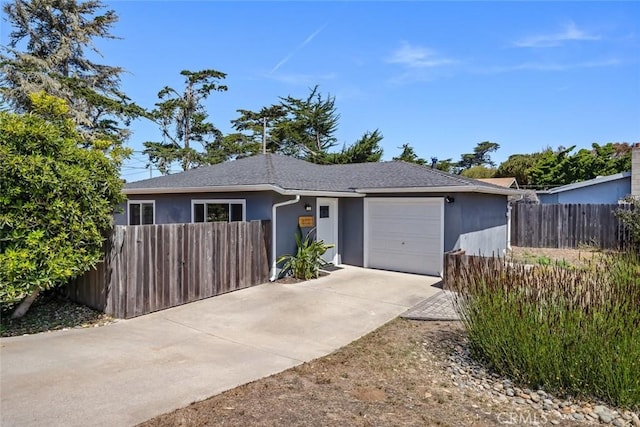 870 El Moro Ave, Los Osos, CA 93402 - ranch-style home featuring a garage, stucco siding, concrete driveway, and roof with shingles
