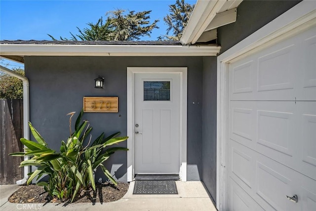 870 El Moro Ave, Los Osos, CA 93402 - entrance to property featuring stucco siding and a garage