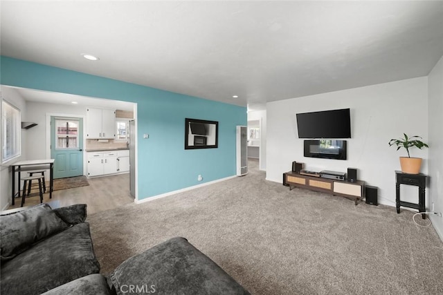 870 El Moro Ave, Los Osos, CA 93402 - living area with light colored carpet, recessed lighting, and baseboards