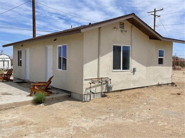 6663 Sage Ave Unit 29, Palms, CA 92277 - view of side of property with stucco siding