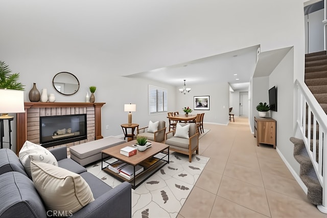 43007 Pearlwood Dr, Lancaster, CA 93536 - living room with stairway, light tile patterned floors, a chandelier, and baseboards