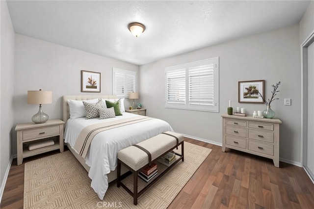 43007 Pearlwood Dr, Lancaster, CA 93536 - bedroom featuring baseboards and wood finished floors