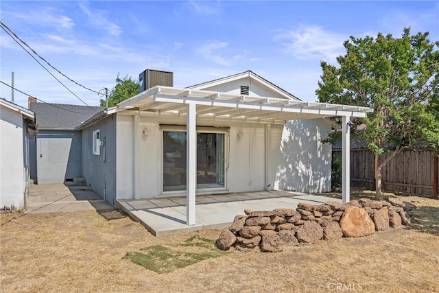 417 Jefferson St, Willows, CA 95988 - rear view of house with a patio area, a pergola, and central AC unit