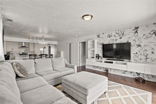 417 Jefferson St, Willows, CA 95988 - living room featuring a chandelier and wood finished floors