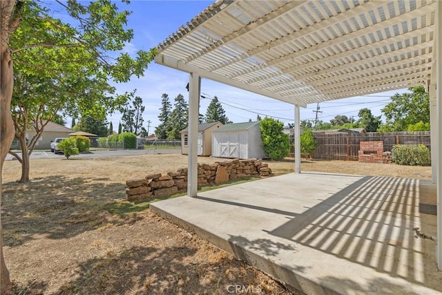 417 Jefferson St, Willows, CA 95988 - fenced backyard featuring a patio and a pergola