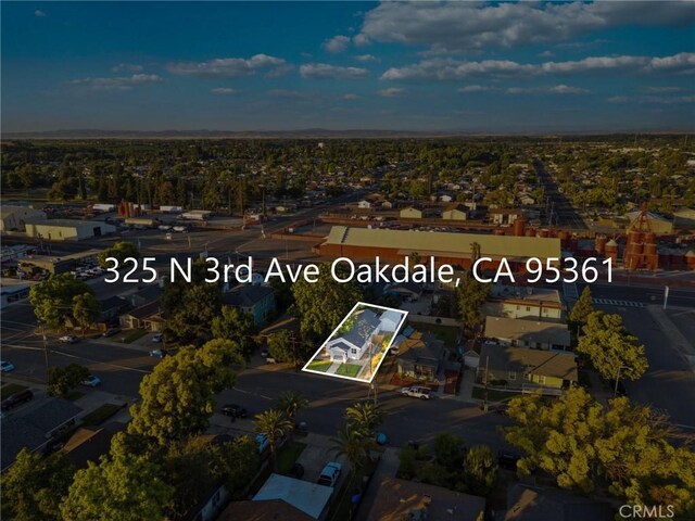 325 N 3rd Ave, Oakdale, CA 95361 - aerial view of property's location featuring property parcel outlined and nearby suburban area
