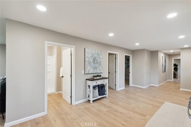 325 N 3rd Ave, Oakdale, CA 95361 - unfurnished living room with light wood finished floors, recessed lighting, and baseboards
