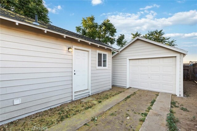 325 N 3rd Ave, Oakdale, CA 95361 - detached garage featuring concrete driveway
