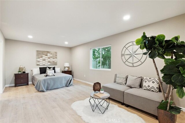 325 N 3rd Ave, Oakdale, CA 95361 - bedroom with wood finished floors, baseboards, and recessed lighting