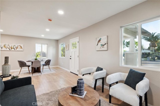325 N 3rd Ave, Oakdale, CA 95361 - living room with recessed lighting, light wood-style floors, and baseboards