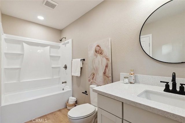 325 N 3rd Ave, Oakdale, CA 95361 - full bathroom with wood finished floors, vanity, toilet, and shower / bathtub combination