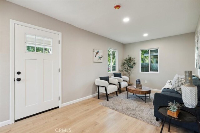 325 N 3rd Ave, Oakdale, CA 95361 - foyer entrance with light wood-style floors, baseboards, and recessed lighting
