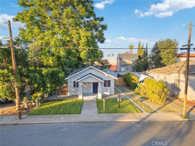 325 N 3rd Ave, Oakdale, CA 95361 - view of front of house with a porch