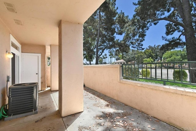 7254 Shoreline Dr Unit 131, San Diego, CA 92122 - view of patio / terrace with central AC unit