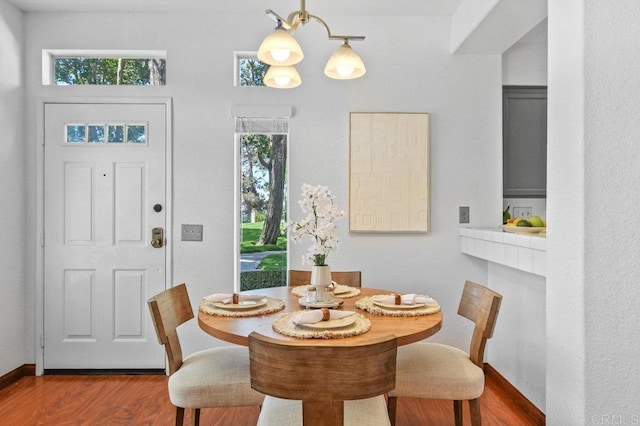 7254 Shoreline Dr Unit 131, San Diego, CA 92122 - dining area featuring wood finished floors and baseboards