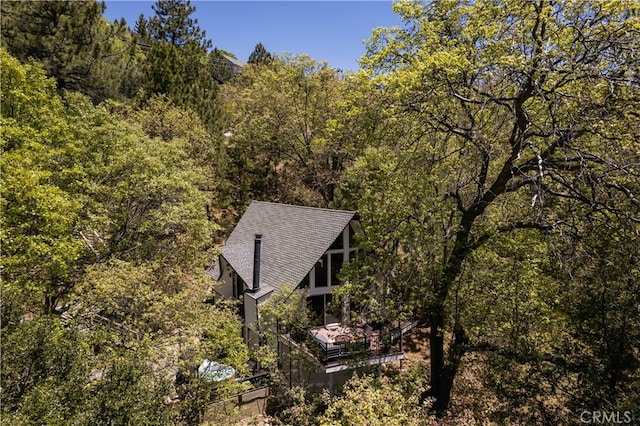 27663 N Bay Rd, Lake Arrowhead, CA 92352 - view of subject property featuring a heavily wooded area