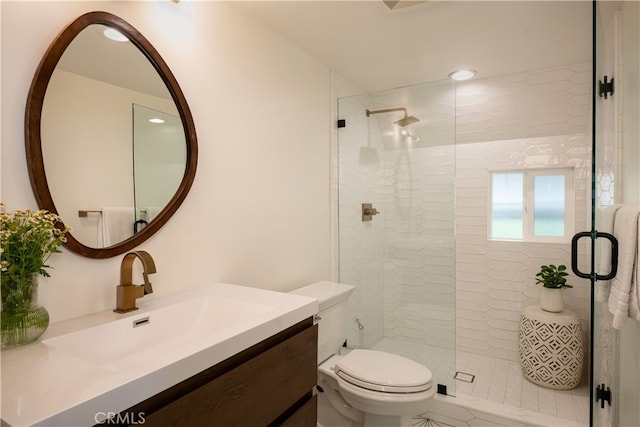 27663 N Bay Rd, Lake Arrowhead, CA 92352 - bathroom with vanity, toilet, a stall shower, and recessed lighting
