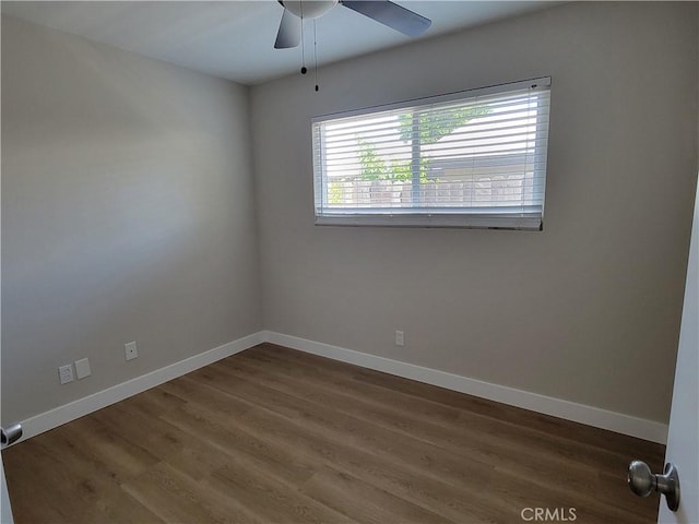15475 Shadow Mountain Ln, Lake Elsinore, CA 92530 - unfurnished room featuring dark wood finished floors and ceiling fan