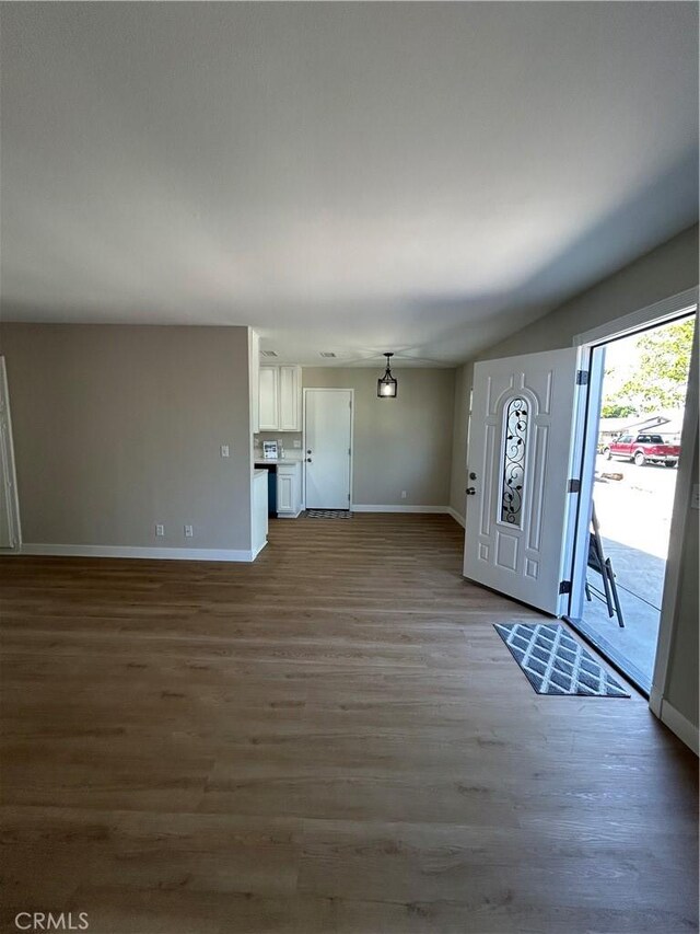 15475 Shadow Mountain Ln, Lake Elsinore, CA 92530 - entryway with baseboards and wood finished floors
