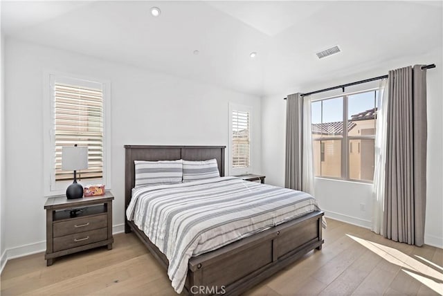 113 Imagination Trl, Irvine, CA 92620 - bedroom with light wood-type flooring, recessed lighting, and baseboards