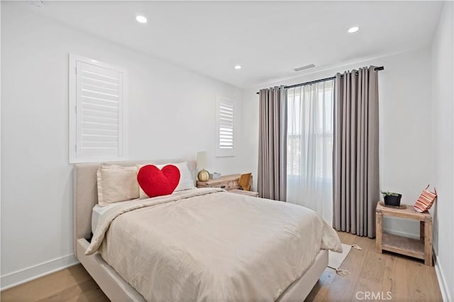 113 Imagination Trl, Irvine, CA 92620 - bedroom with light wood-type flooring, baseboards, and recessed lighting