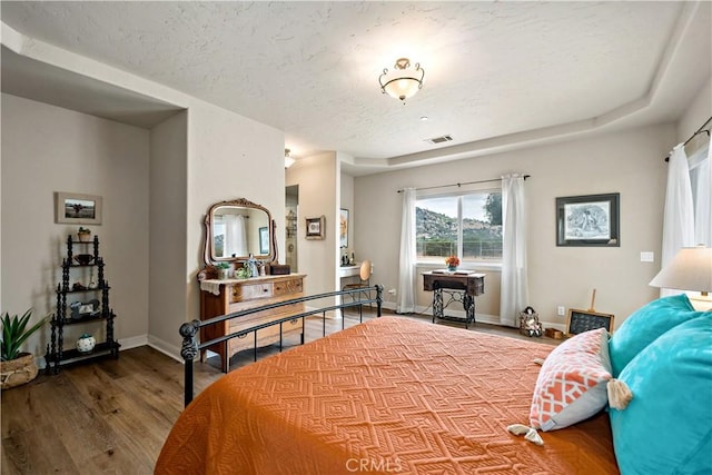 10204 Mount Olympus Valley Rd, Fallbrook, CA 92028 - bedroom featuring a textured ceiling, wood finished floors, and baseboards