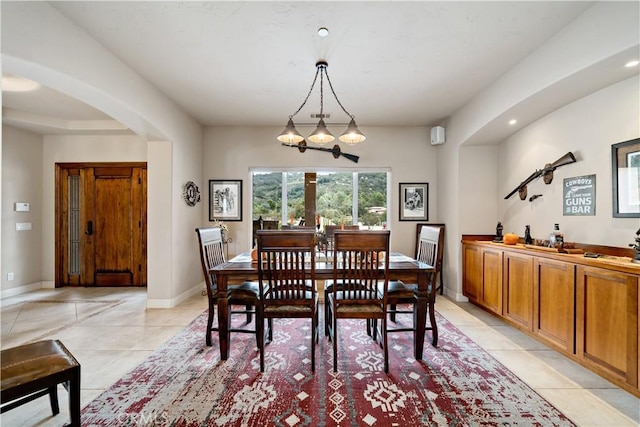 10204 Mount Olympus Valley Rd, Fallbrook, CA 92028 - dining room featuring light tile patterned flooring, arched walkways, baseboards, a chandelier, and recessed lighting